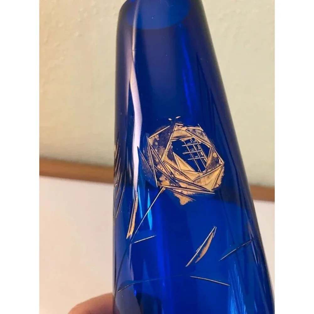 blue glass vase with etched rose